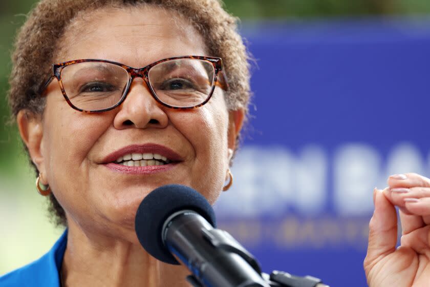 Los Angeles, CA - May 17: Karen Bass takes the microphone after Mike Feuer drops out of the mayoral race to endorse Bass at the Encino Park on Tuesday, May 17, 2022 in Los Angeles, CA. (Dania Maxwell / Los Angeles Times)