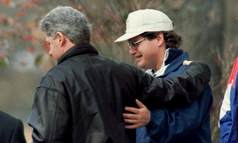 Former President Bill Clinton comforts his half-brother Roger in 1994, shortly after their mother’s death. <a href="https://media.gettyimages.com/id/51607186/photo/u-s-president-bill-clinton-comforts-his-half.jpg?s=1024x1024&w=gi&k=20&c=qAhkpjleuXF8jvjSlaqK6NL19d8RF15Al3Etif1G3ag=" rel="nofollow noopener" target="_blank" data-ylk="slk:POOL/AFP via Getty Images;elm:context_link;itc:0;sec:content-canvas" class="link ">POOL/AFP via Getty Images</a>