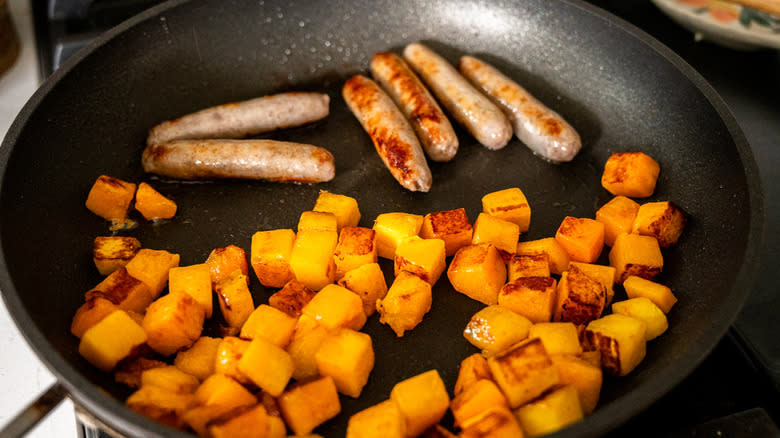 sausages and squash in pan