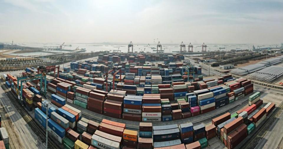 fish eye view of thousands of shipping containers at a chinese port