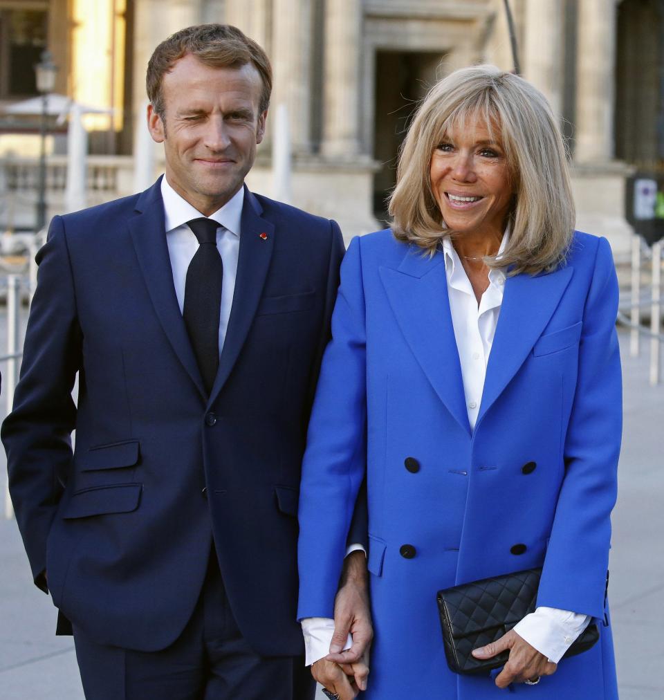 Emmanuel and Brigette in front of the Elysee Palace