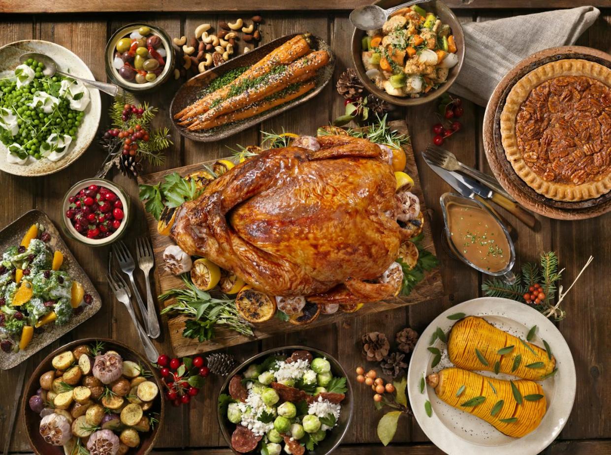 A delicious – and safe – holiday spread involves careful foreplanning and preparation. <a href="https://www.gettyimages.com/detail/photo/holiday-turkey-dinner-royalty-free-image/836012728?phrase=thanksgiving+dinner&searchscope=image%2Cfilm&adppopup=true" rel="nofollow noopener" target="_blank" data-ylk="slk:Lauri Patterson/E+ via Getty Images;elm:context_link;itc:0;sec:content-canvas" class="link ">Lauri Patterson/E+ via Getty Images</a>