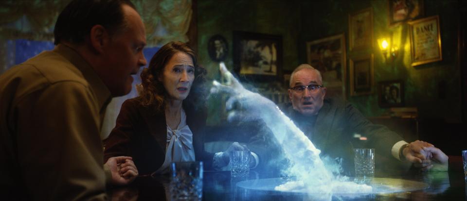 A World War II colonel (Larry Fessenden, far left), a former interrogator (Anne Ramsay) and her husband (Ron E. Rains) have a ghostly encounter in the period horror film "Brooklyn 45."