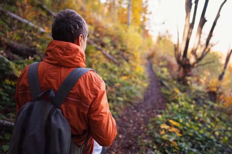 man in orange jacket