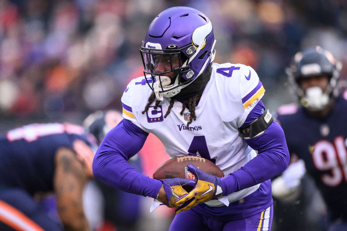 Jan 8, 2023; Chicago, Illinois, USA; Minnesota Vikings running back Dalvin Cook (4) runs the ball during the first quarter against the Chicago Bears at Soldier Field. Mandatory Credit: Daniel Bartel-USA TODAY Sports Daniel Bartel/Daniel Bartel-USA TODAY Sports