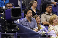 Actor Lin-Manuel Miranda, center, looks on at a match between Novak Djokovic, of Serbia, and Jenson Brooksby, of the United States, during the fourth round of the U.S. Open tennis championships at Arthur Ashe Stadium, Monday, Sept. 6, 2021, in New York. (AP Photo/John Minchillo)