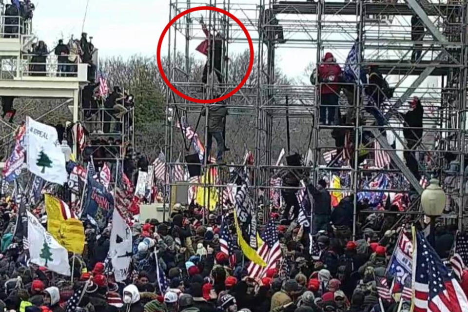 The man identified as Banuelos seen appearing to fire a weapon in Capitol CCTV footage. (U.S. Attorney's Office for the District of Columbia)