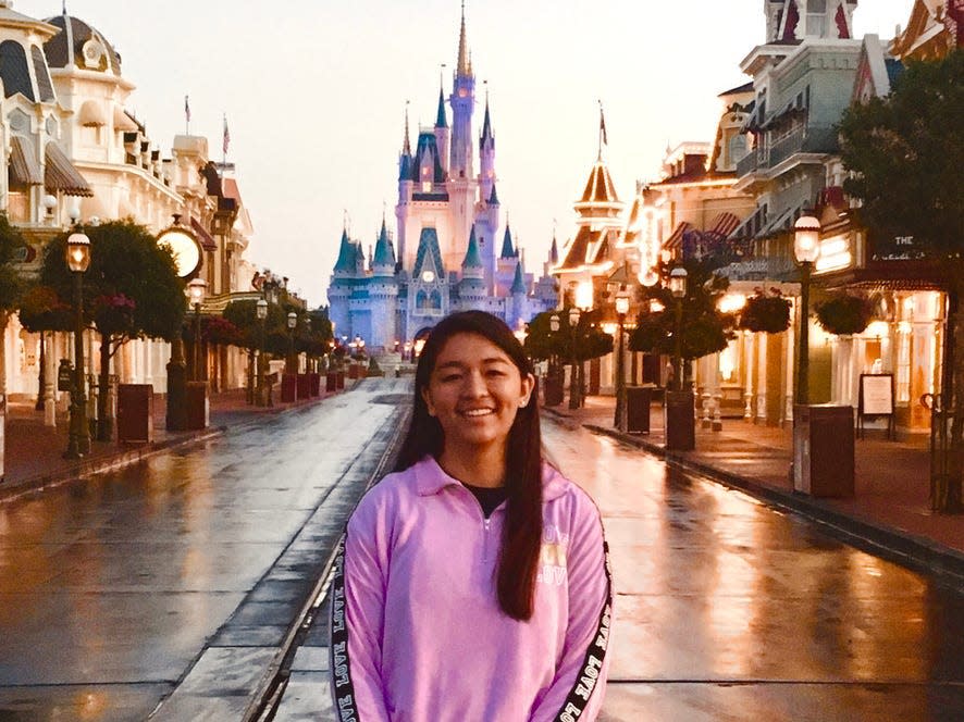 saira on an empty main street usa at magic kingdom disney world