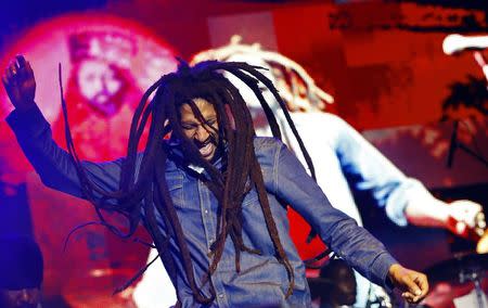 Julian Marley, son of the late reggae icon Bob Marley, performs at a concert celebrating his father's 69th birthday at the National Stadium in Kingston, February 7, 2014. REUTERS/Gilbert Bellamy