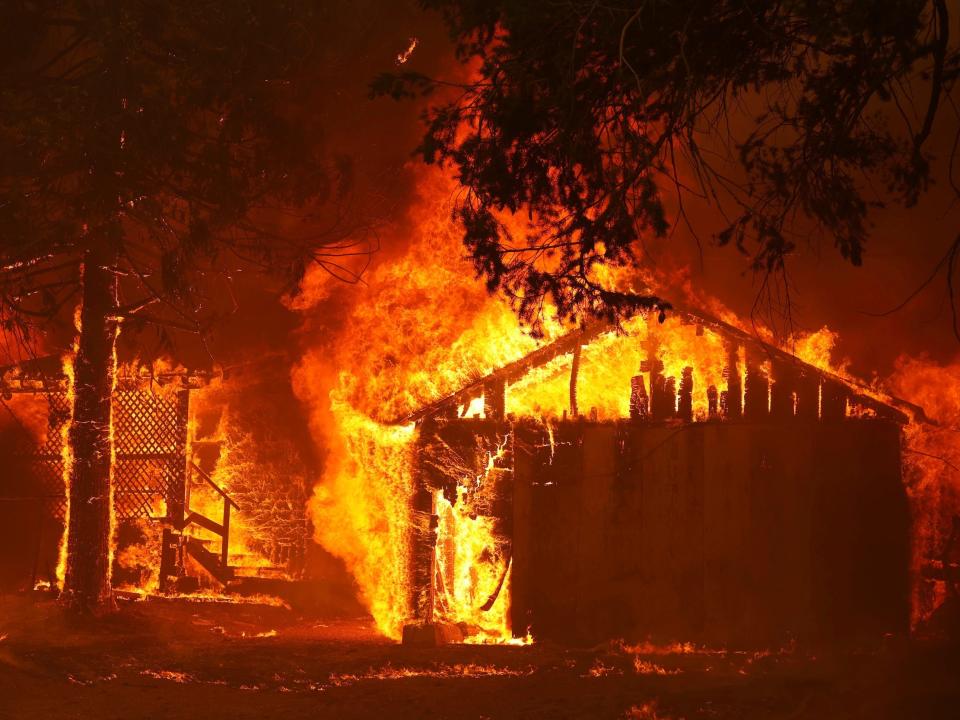 california wildfire house in flames burning down
