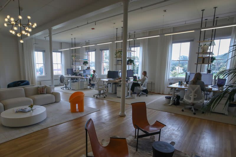 Employees are seen at venture capital firm Headline's office at the Presidio in San Francisco