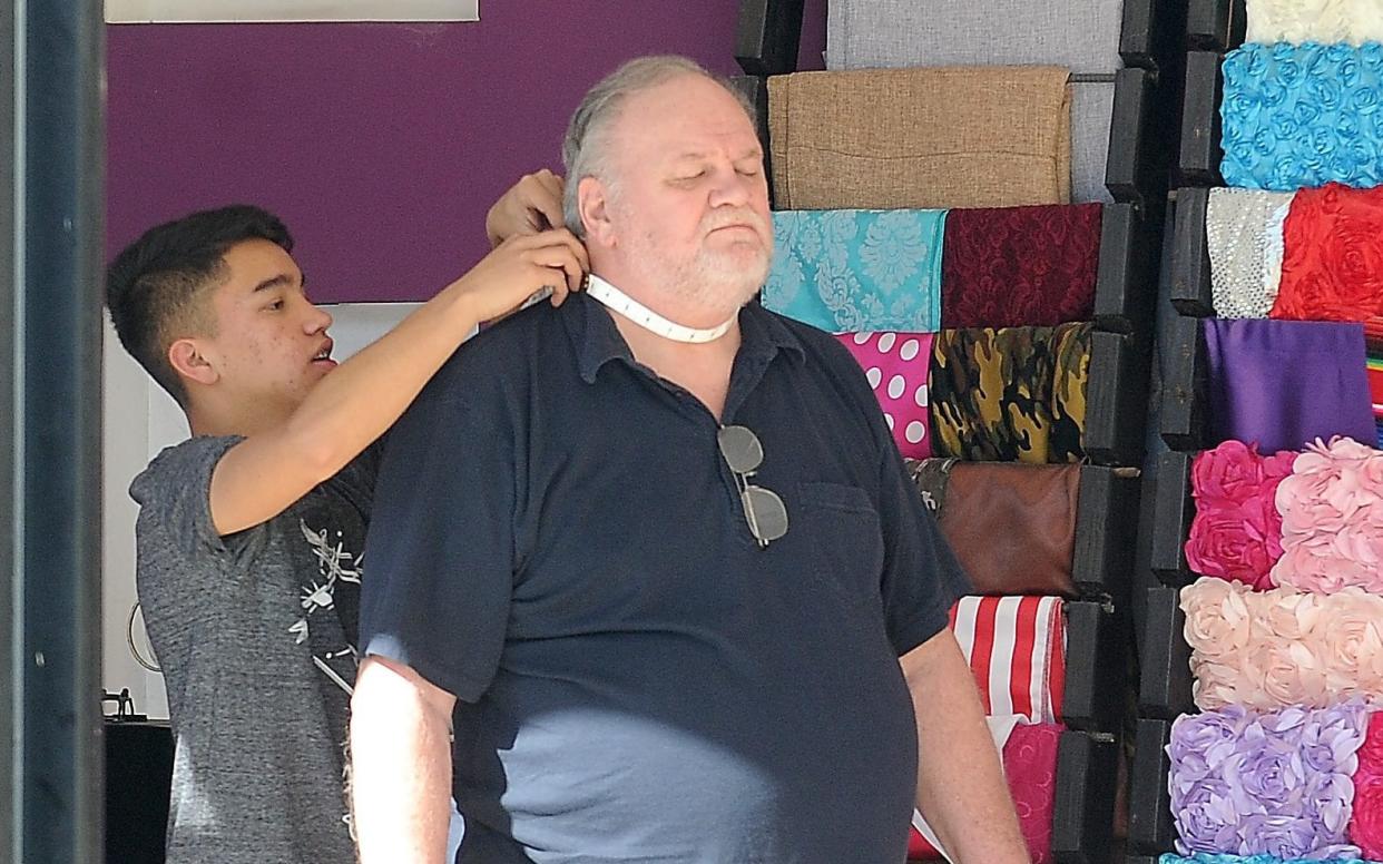 Thomas Markle, soon to be embraced by the Royal Family, caused a stir when he was photographed in public looking at pictures of his daughter and getting himself measured for a suit - Coleman-Rayner