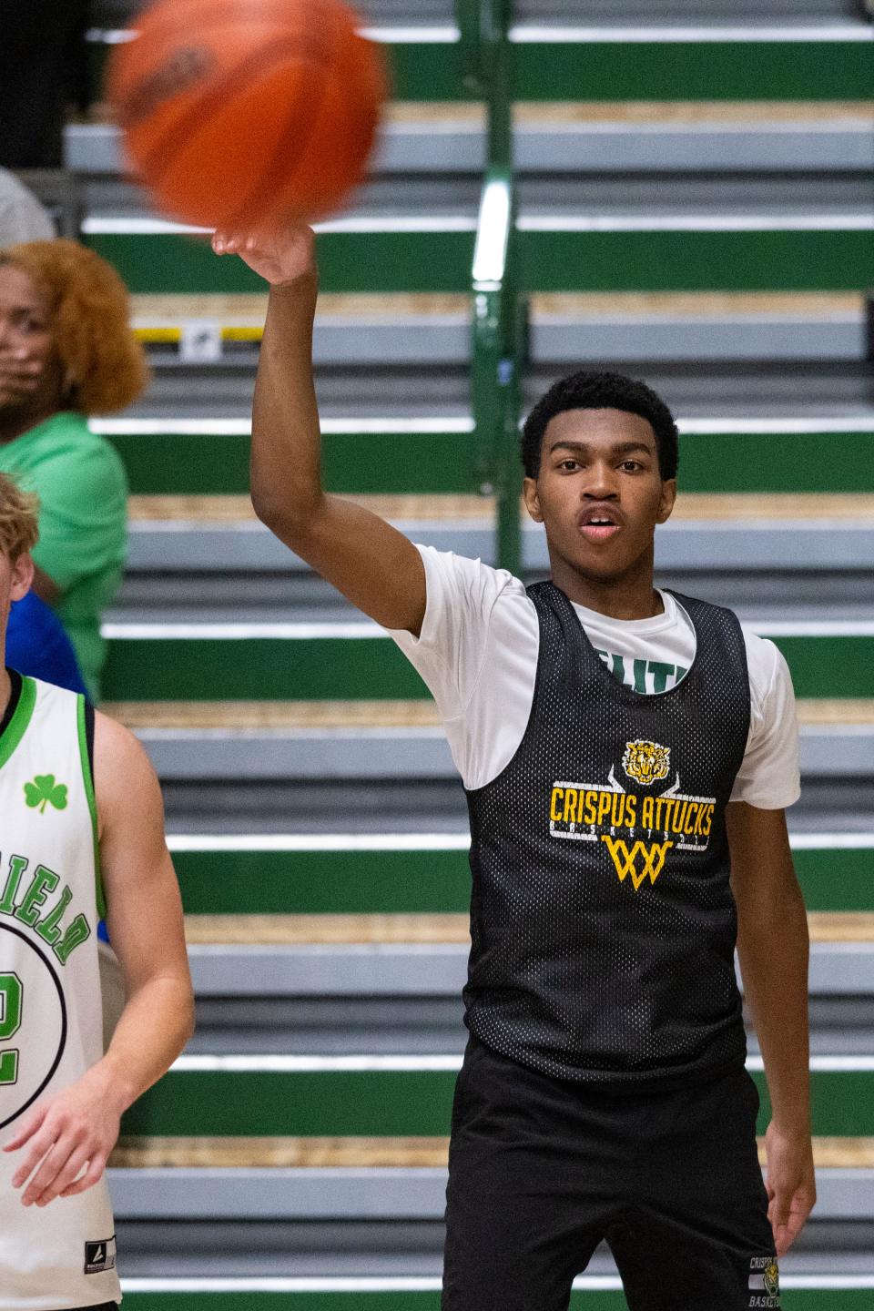 Indianapolis Crispus Attucks High School's Ron Rutland (5) watches as a 3-point shot hits during Charlie Hughes Shootout basketball action, Saturday, June 24, 2023, at Westfield High School.