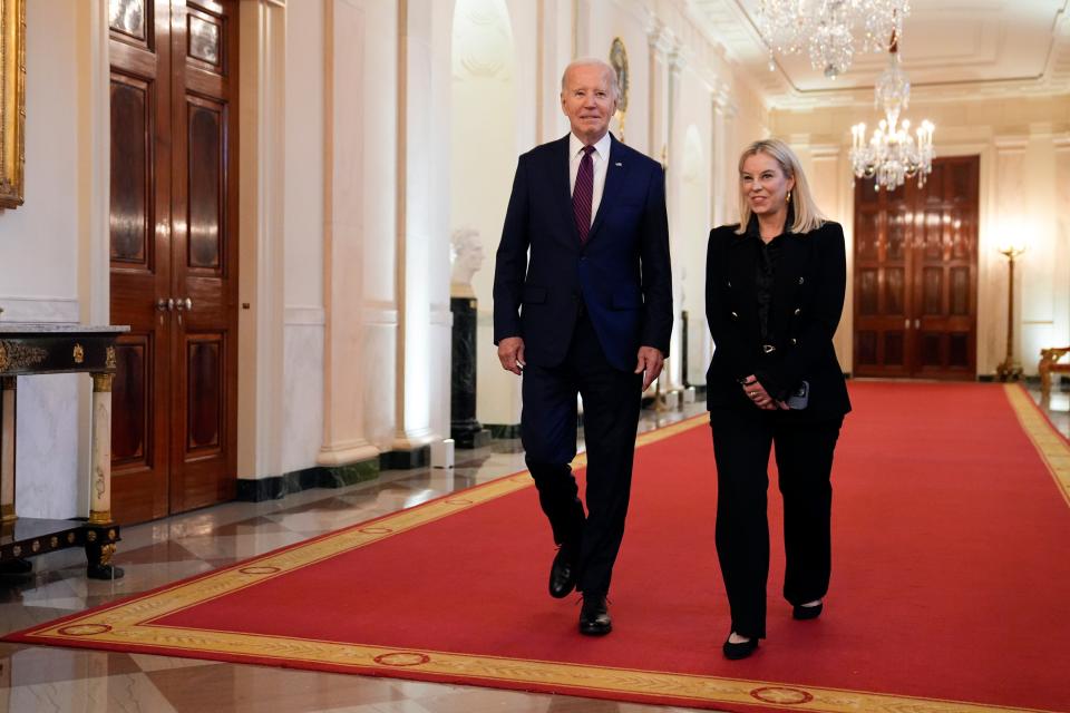 Reno Mayor Hillary Schieve arrives with President Joe Biden to the East Room for an event for mayors attending the U.S. Conference of Mayors Winter Meeting to the White House, Friday, Jan. 19, 2024, in Washington, D.C.