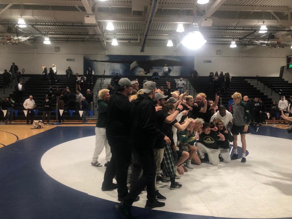 The Brick Memorial wrestling team is pictured after it defeated Middletown South Wednesday in the NJSIAA Central Group 4 championship match.