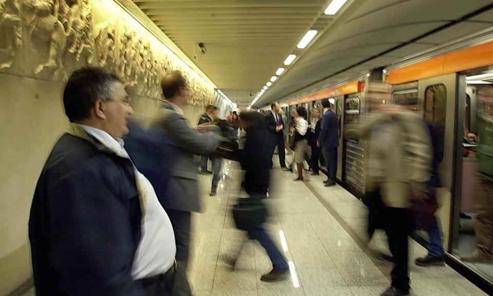 Commuters at Acropolis metro station in Athens