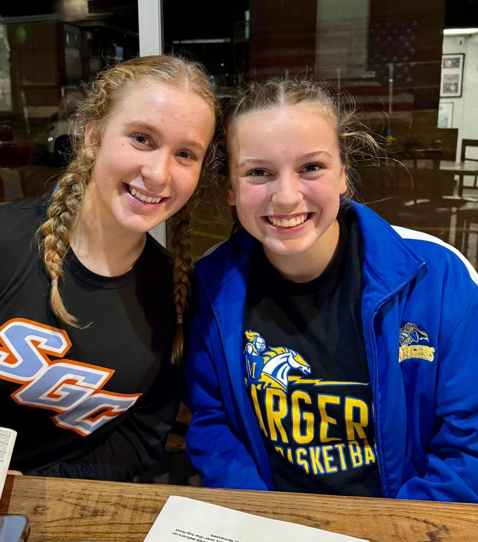 Ruby Hayes, 13, right, at The Grind restaurant in Martin, Tenn., Nov. 13, 2023, minutes before a buck deer crashed through the front window and ripped open her shoulder with its hoof. Hayes, pictured with her friend, Ava Owens, 13, of Medina, Tenn., got 11 stitches at a nearby hospital and was released