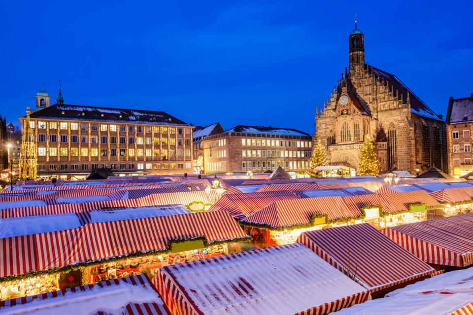 Nuremberg’s Christkindlmarkt is opened with a speech from a woman dressed as the Christkindl, a traditional gift-bringer in some forms of Christianity (Getty Images/iStockphoto)