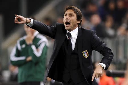 Italy's head coach Antonio Conte reacts during their international friendly soccer match against England at Juventus Stadium in Turin March 31, 2015. REUTERS/Giorgio Perottino