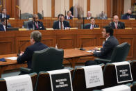Mauricio Gutierrez, right, President and CEO of NRG, and Kirk Morgan, Vistra chief executive officer, left, answerer questions for the Committees on State Affairs and Energy Resources as they hold a joint public hearing to consider the factors that led to statewide electrical blackouts, Thursday, Feb. 25, 2021, in Austin, Texas. The hearings were the first in Texas since a blackout that was one of the worst in U.S. history, leaving more than 4 million customers without power and heat in subfreezing temperatures. (AP Photo/Eric Gay)
