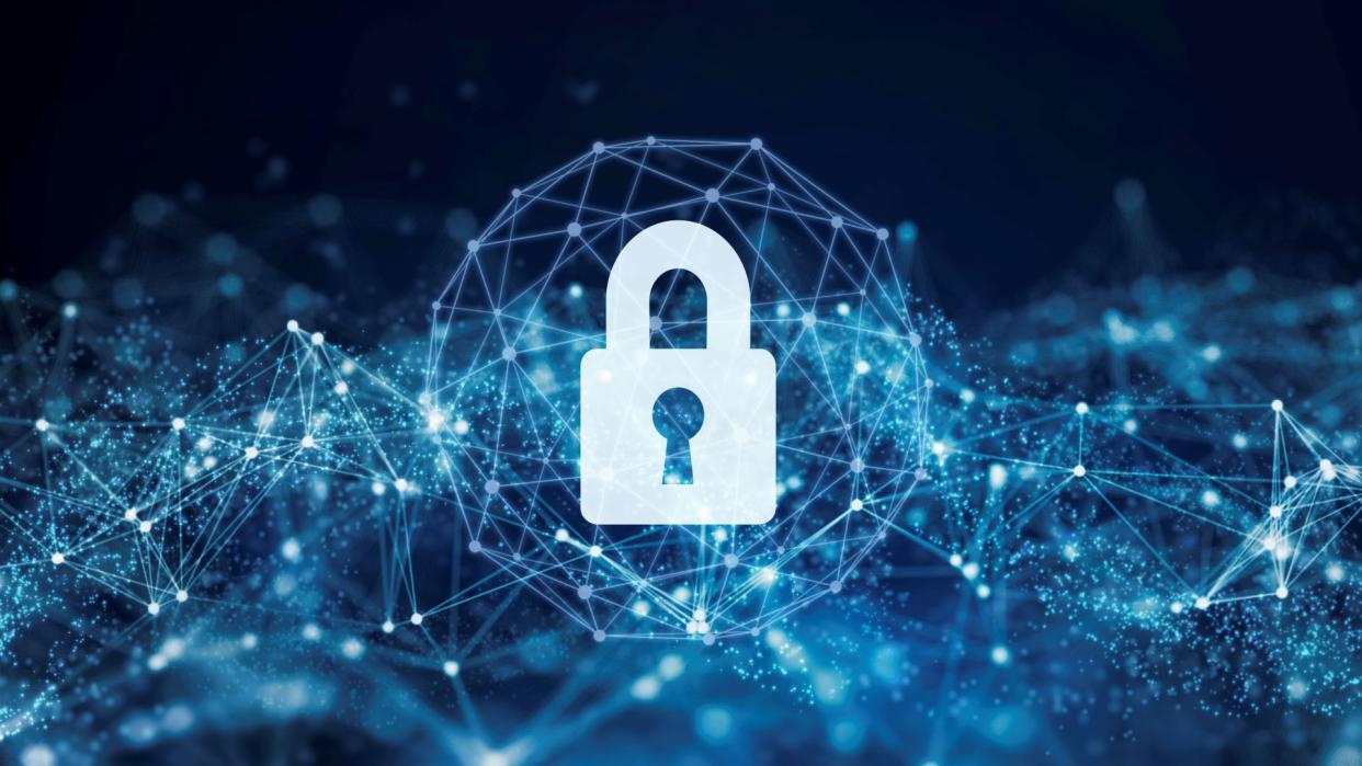  Security padlock in circuit board, digital encryption concept. 