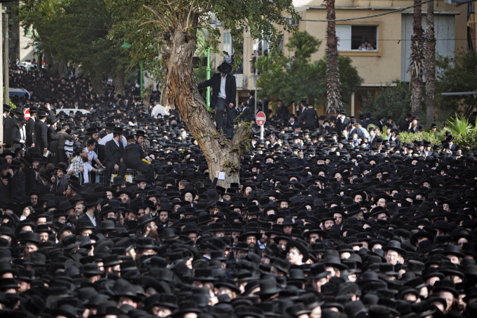 <p>Ultra-Orthodox Jews attend the funeral of Rabbi Moshe Yehoshua Hager, leader of the Hassidic sect Vizhnitz in Israel, in Bnei Brak, an Ultra-Orthodox Jewish town near Tel Aviv, Israel, March 14, 2012. (Photo: Oded Balilty/AP) </p>