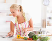 Give your thighs and backside a workout while you're waiting for dinner to cook. Using the counter to steady yourself, gently flex one raised leg out to the side until you feel the stretch in your hip. Repeat for a count of 10 and swap to the other side. Then, flex your raised leg backwards until you feel the stretch in your bottom, for a count of 10. Repeat on the opposite side. Control the movement and don't lock your knees.