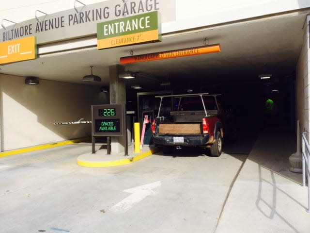 A reader asks about parking deck gate instructions at the Aloft Hotel parking deck operated by the city of Asheville.