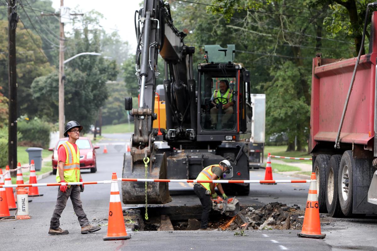 Rescue workers repair sinkhole in Port Chester