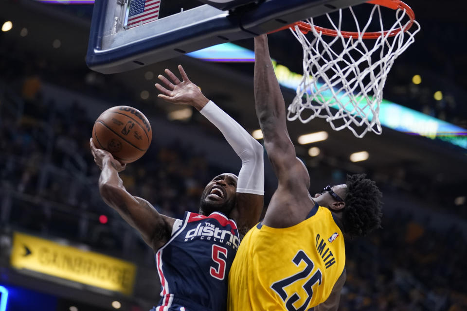 Washington Wizards' Will Barton (5) shoots against Indiana Pacers' Isaiah Jackson (22) during the first half of an NBA basketball game Wednesday, Oct. 19, 2022, in Indianapolis. (AP Photo/Michael Conroy)