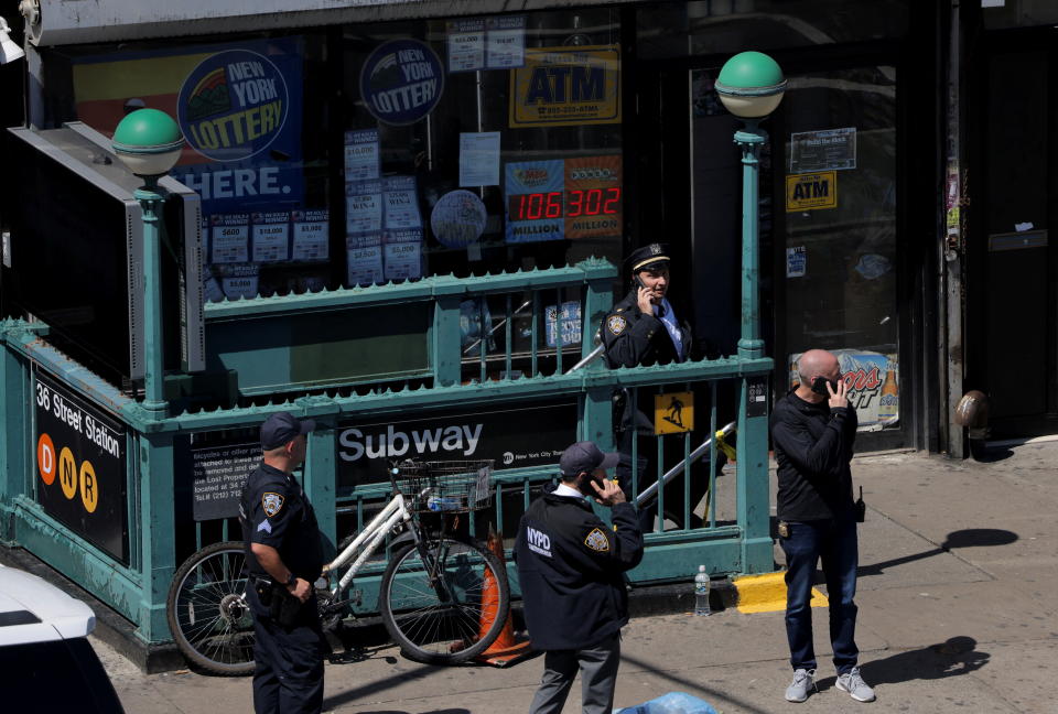 Law enforcement officers outside the scene of the shooting