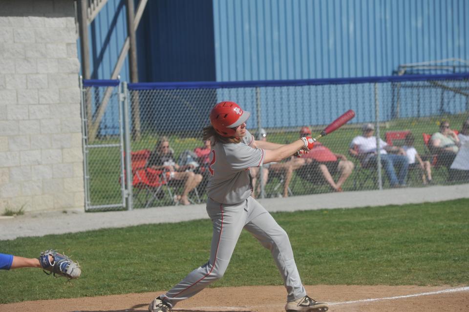 Buckeye Central's Alex Kanney swings at a pitch.