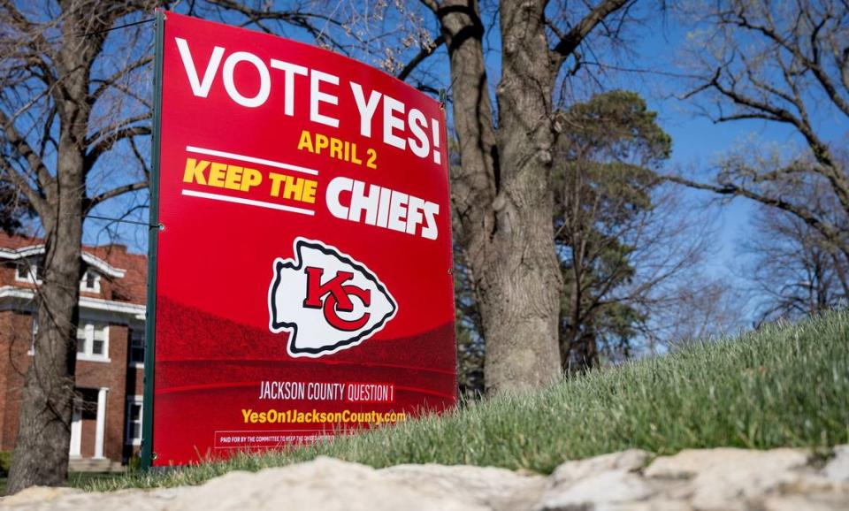 A yard sign in Kansas City urges voters to support a ballot measure to approve a 40-year, 3/8th-cent sales tax for a new Royals stadium and improvements to Arrowhead Stadium.