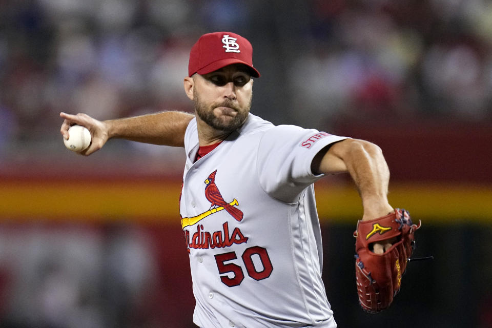 St. Louis Cardinals starting pitcher Adam Wainwright throws against the Arizona Diamondbacks during the first inning of a baseball game Monday, July 24, 2023, in Phoenix. (AP Photo/Ross D. Franklin)