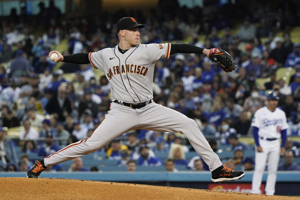 San Francisco Giants starting pitcher Anthony DeSclafani throws to a Los Angeles Dodgers batter during the first inning of Game 4 of a baseball National League Division Series, Tuesday, Oct. 12, 2021, in Los Angeles. (AP Photo/Marcio Jose Sanchez)