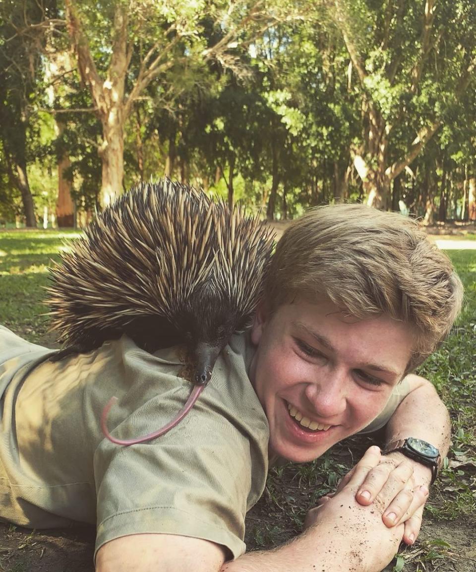 Robert Irwin and an echidna