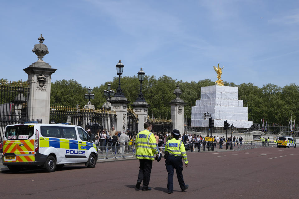 Building work in preparation for the Platinum Jubilee celebrations take place in front of Buckingham Palace in London, Friday, May 6, 2022. Britain's Queen Elizabeth II acceded to the throne on the death of her father King George VI on Feb. 6, 1952, and the Platinum Jubilee bank holiday weekend celebrations will take place on June 2-5. (AP Photo/Kirsty Wigglesworth)