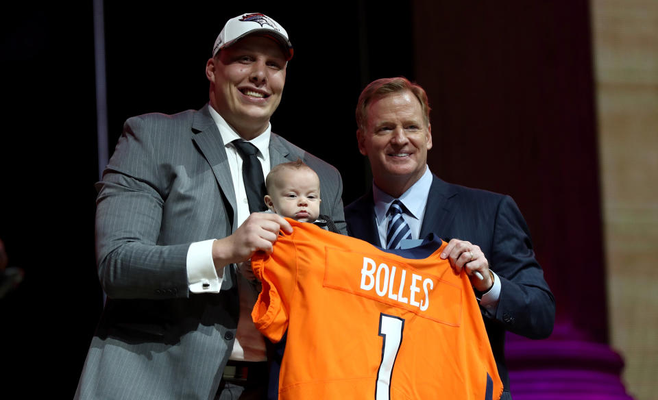 <p>Garett Bolles of Utah and his son Kingston pose with Commissioner of the National Football League Roger Goodell after being picked #20 overall by the Denver Broncosduring the first round of the 2017 NFL Draft at the Philadelphia Museum of Art on April 27, 2017 in Philadelphia, Pennsylvania. (Photo by Elsa/Getty Images) </p>