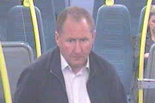 CCTV image: A man police want to speak after a man bit another passenger's ear on a train in south London: BTP