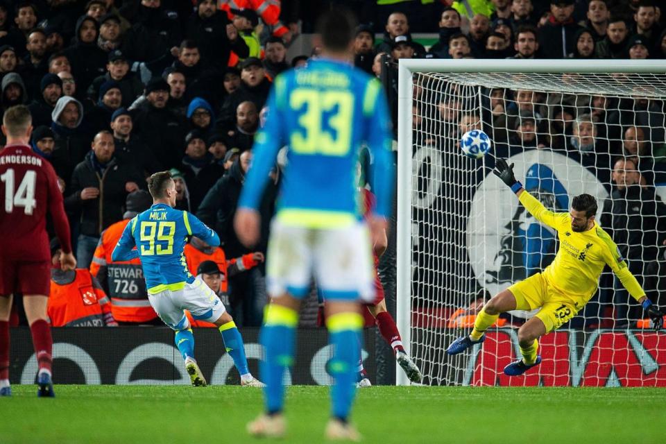 Stunning save: Alisson denies Milik at the death (EPA)