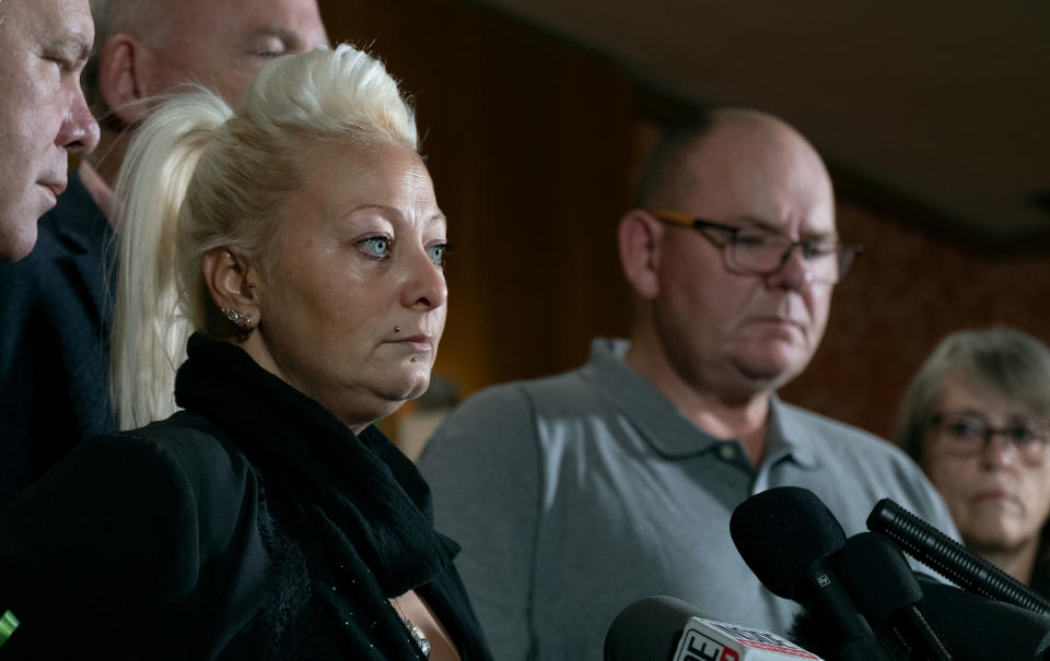 Charlotte Charles, mother of Harry Dunn, who died after his motorbike was involved in an August 2019 accident in Britain with Anne Sacoolas, wife of an American diplomat, speaks at a news conference as she is joined by Dunn's father Tim Dunn, center right, and other family members and supporters Monday, Oct. 14, 2019, in New York. The family is seeking answers after Sacoolas returned to the United States after being granted diplomatic immunity following the crash. (AP Photo/Craig Ruttle)