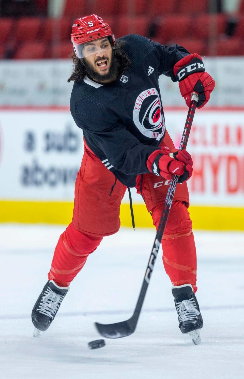 The Carolina Hurricanes Jalen Chatfield (5) works on his shooting form during the Hurricanes’ practice on Monday, May 15, 2023 at PNC Arena in Raleigh, N.C.