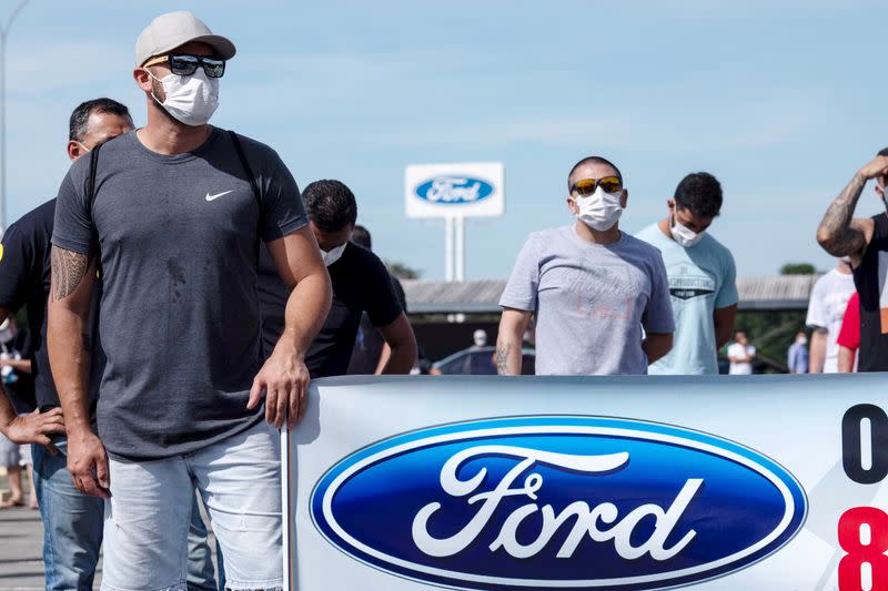 FILE PHOTO: Workers protest at Ford Motor Co's plant in Taubate