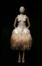 A dress from the Alexander McQueen It's Only a Game Spring Summer 2005 collection is displayed in the Alexander McQueen: Savage Beauty exhibition at the V&A in London, March 12, 2015. REUTERS/Suzanne Plunkett