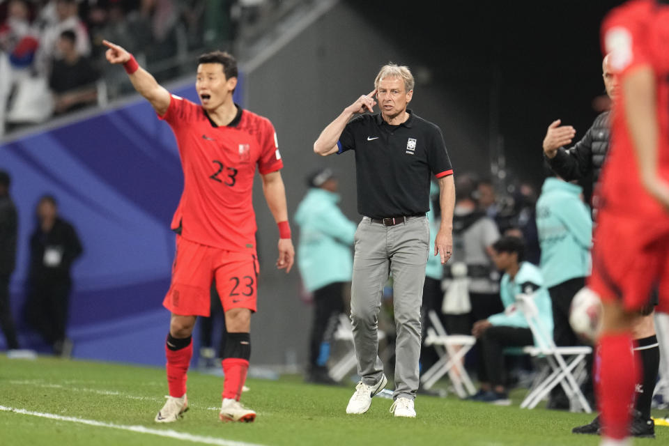 South Korea's head coach Jurgen Klinsmann, center, reacts during the Asian Cup round of 16 soccer match between Saudi Arabia and South Korea at Education City Stadium Al Rayyan, Qatar, Tuesday, Jan. 30, 2024. (AP Photo/Aijaz Rahi)
