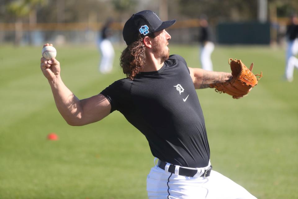 Detroit Tigers pitchers and catchers went through drills and a bullpen session during Spring Training Tuesday, February 14, 2023. Pitcher Michael Lorenzen plays catch before his bullpen session during practice.