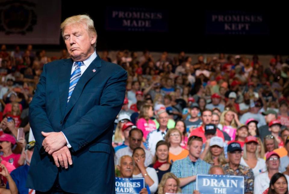 Donald Trump pauses before speaking at the Big Sandy Superstore Arena in Huntington, West Virginia.