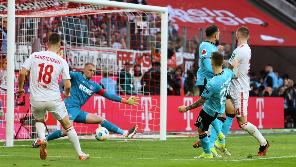 Grimaldo scores Leverkusen's second goal against Köln. - Wolfgang Rattay/Reuters