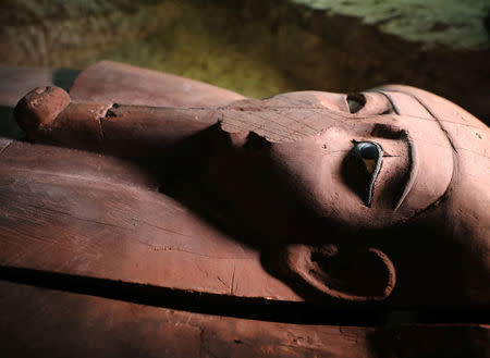 A wooden coffin inside the recently discovered burial site in Minya, Egypt February 24, 2018. REUTERS/Mohamed Abd El Ghany