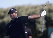 Golf-British Open - Patrick Reed of the U.S. watches his tee shot on the first hole during the first round - Royal Troon, Scotland, Britain - 14/07/2016. REUTERS/Paul Childs